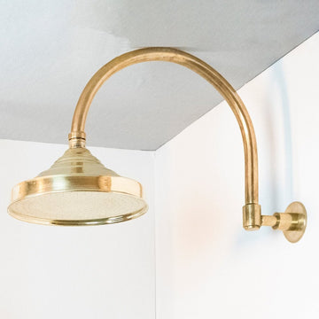 Handcrafted unlacquered brass shower system