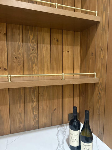 Rail for a shelf