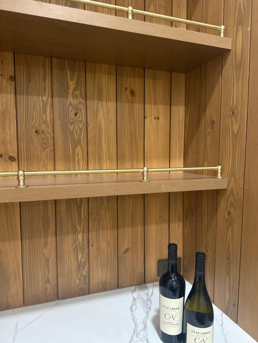 Rail for a shelf