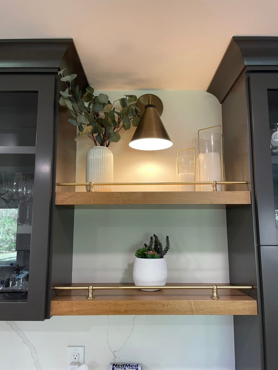 Rail for a shelf